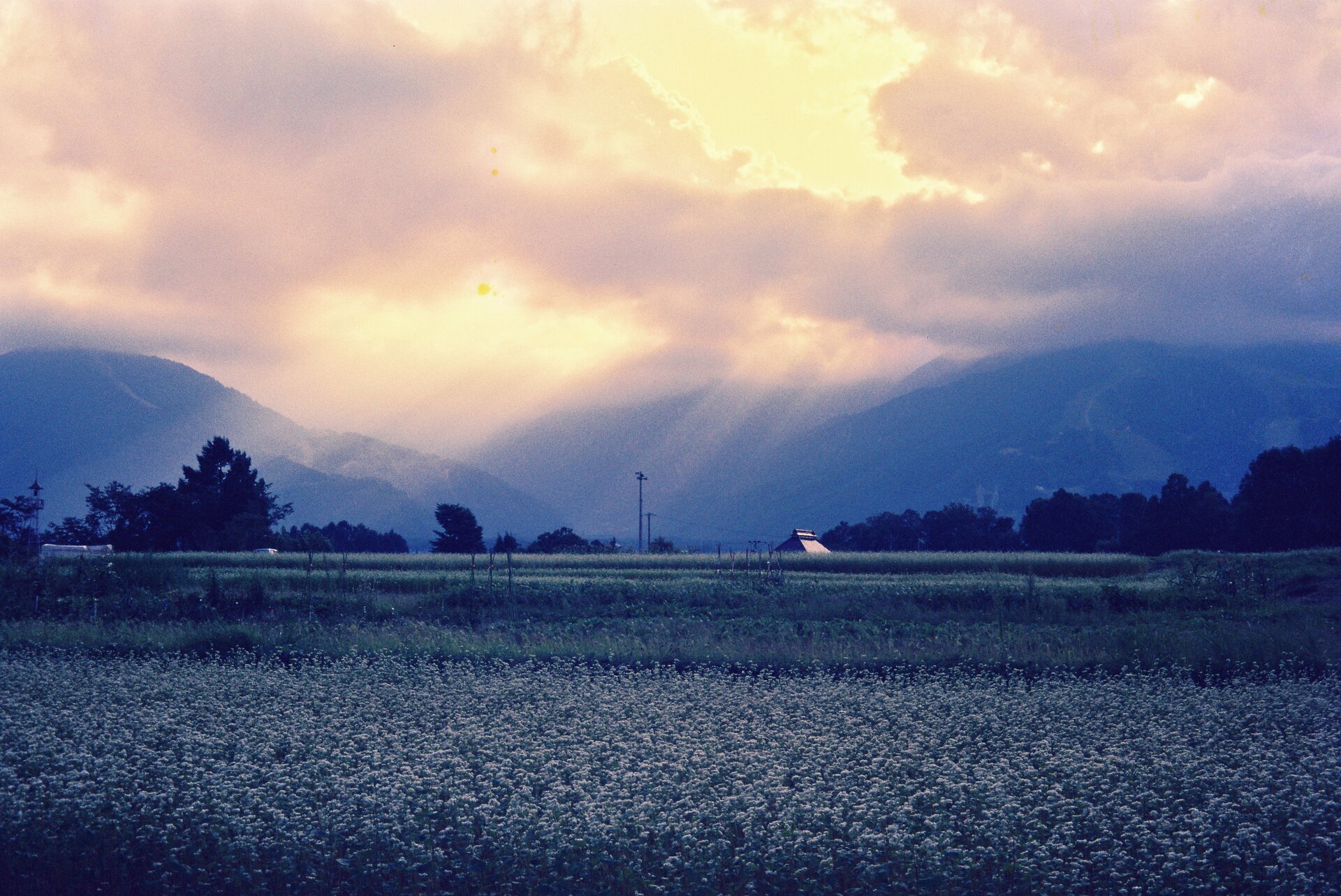 Cloud-covered mountain peaks with dramatic sky
