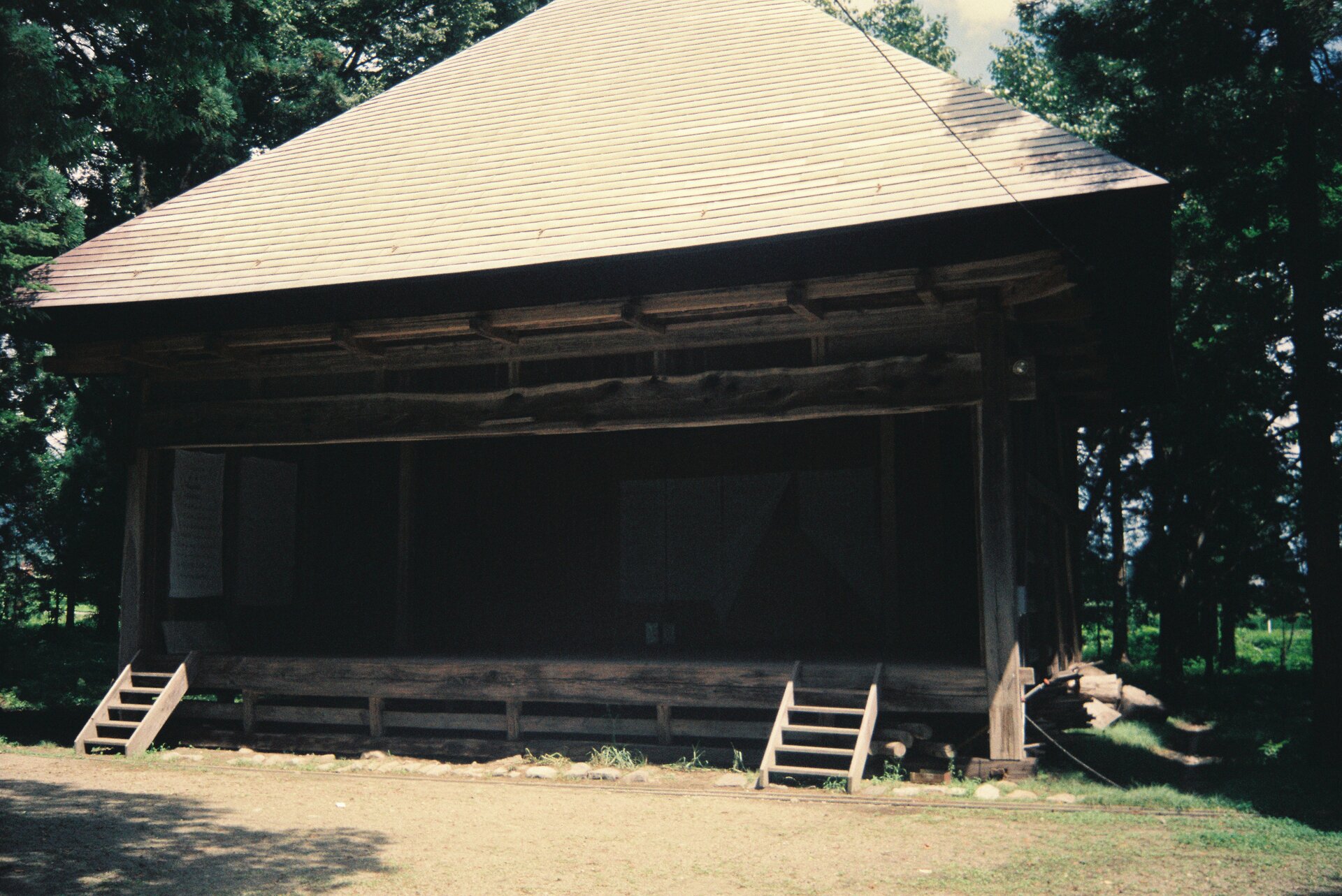 Traditional Japanese wooden architecture with distinctive roof design